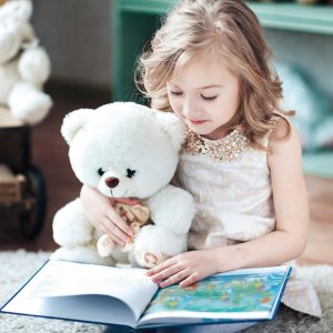 book drive girl reading book with bear