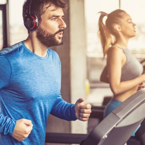 woman and man on treadmill